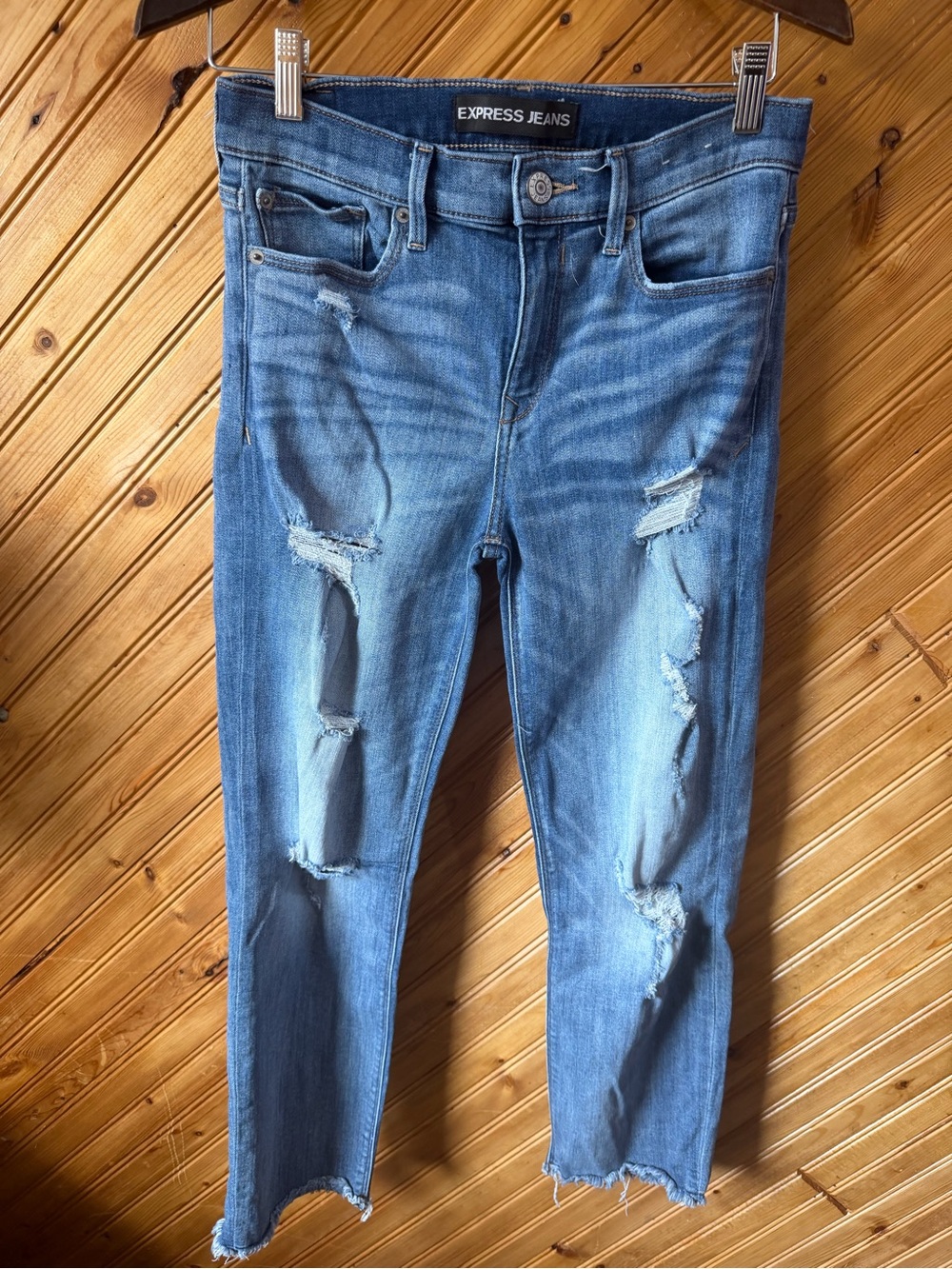 Express Distressed, raw hem Blue Denim Jeans sz 4